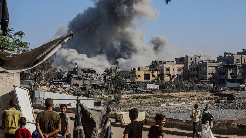 Smoke rises after an Israeli attack on Jabalia camp, north of Gaza on August 20.