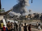 Smoke rises after an Israeli attack on Jabalia camp, north of Gaza on August 20.