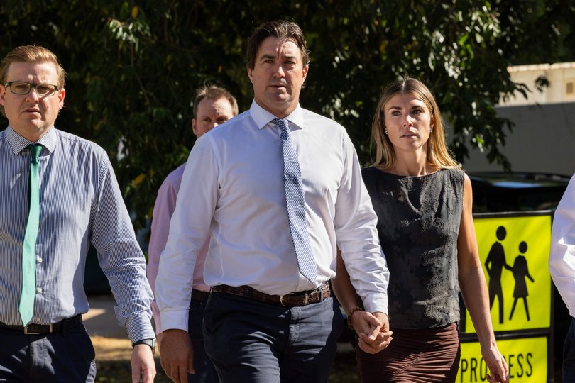Outback Wrangler Matt Wright and his wife Kaia Wright alongside his instructing solicitor Luke Officer.