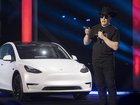 Tesla plans to put hundreds of thousands of driverless cars on US roads over the next year. (AP PHOTO)
