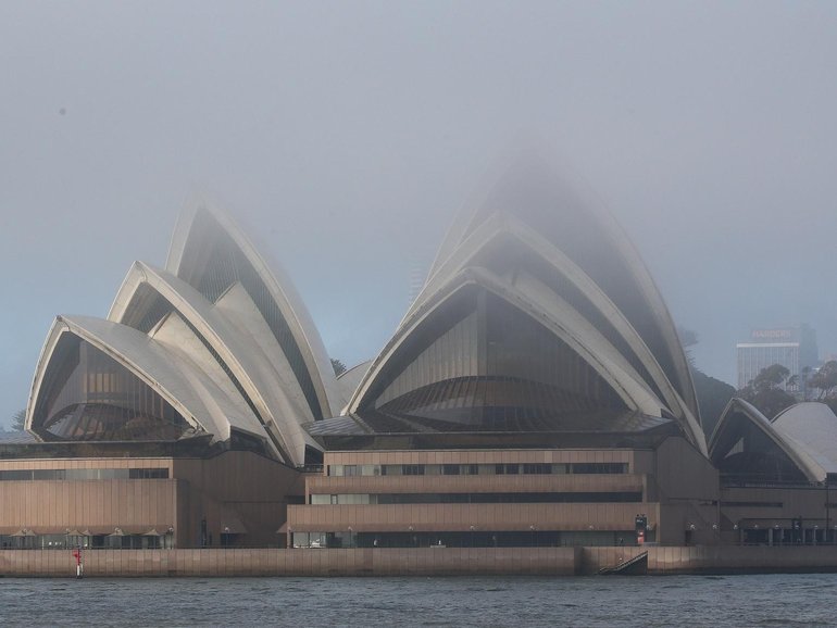 Sydney commuters are being warned of dangerous conditions as fog blankets the city. Photo: NewsWire/ Gaye Gerard