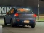 An arsonist has been seen fleeing a tobacco store whilst they were on fire inside a car.
