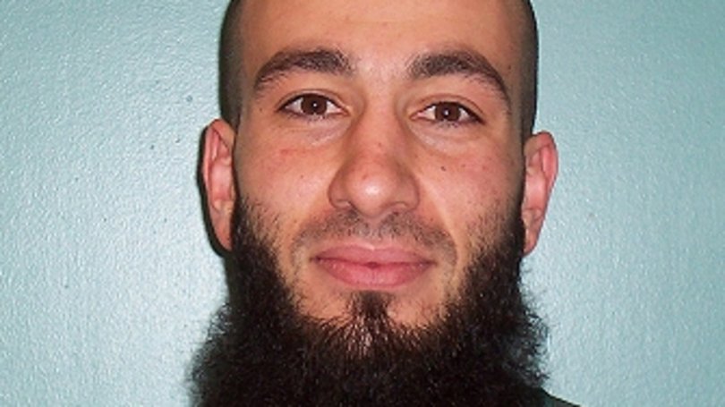 Bassam Hamzy’s face was cut in the jail yard attack.