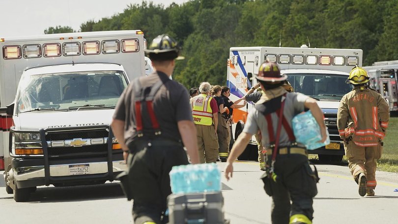 The bus was travelling eastbound when it went into rolled into a ditch, killing five people. (AP PHOTO)