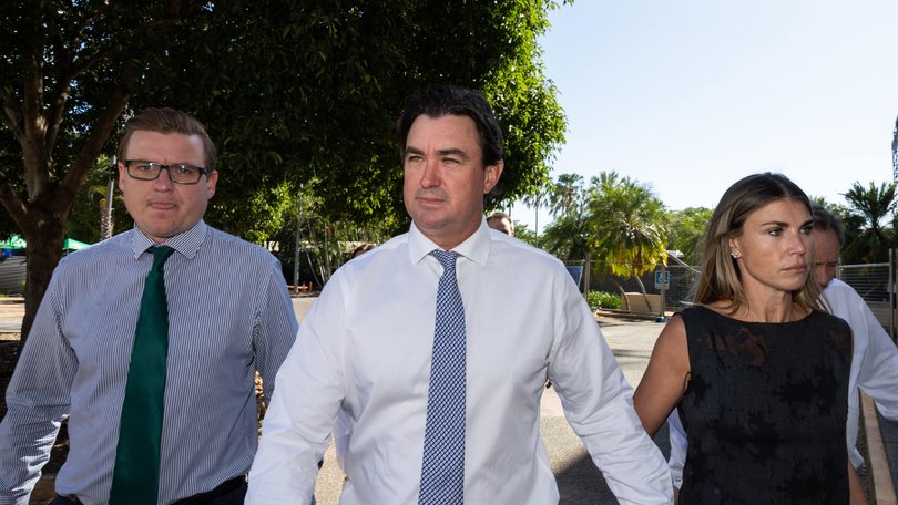 Outback Wrangler Matt Wright and his wife Kaia Wright alongside his instructing solicitor Luke Officer approaching the Supreme Court in Darwin.
