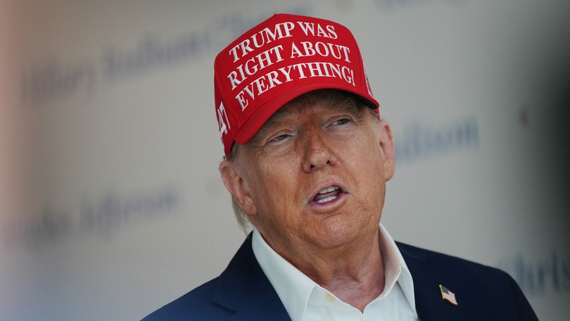 WASHINGTON, DC - AUGUST 22: U.S. President Donald Trump speaks to the media wearing a hat that reads, "Trump Was Right About Everything!," during a visit to The People's House: A White House Experience August 22, 2025 in Washington, DC. Trump spoke on a variety of issues including stating he did not know of the FBI raid currently happening on former national security adviser John Bolton's home, and saying he learned of it by seeing the news on television. (Photo by Kevin Dietsch/Getty Images)