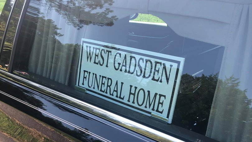 Mother charged for leaving her child at a funeral home.