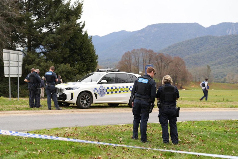 Police at the scene of a shooting in the high country of Porepunkah in Victoria,Tuesday, August 26, 2025.Parts of a rural town, including a primary school, have been placed into lockdown after two police officers were reportedly shot dead and a thrid critically injured. (AAP Image/Simon Dallinger) NO ARCHIVING Picture: SIMON DALLINGER