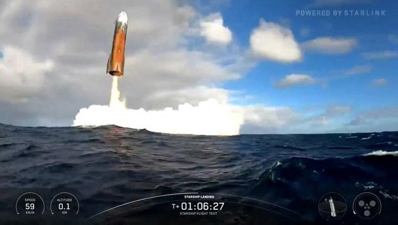 This still image taken from a SpaceX broadcast shows the upper stage of SpaceX's Starship rocket splashing down in the Indian Ocean.
