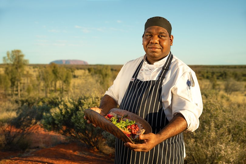 Voyages Indigenous Tourism Australia operates fine-dining experience Tali Wiru in the dunes overlooking Uluru.