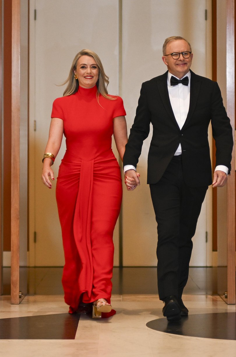Anthony Albanese and fiancee Jodie Haydon arrive for the Midwinter Ball at Parliament House in Canberra.