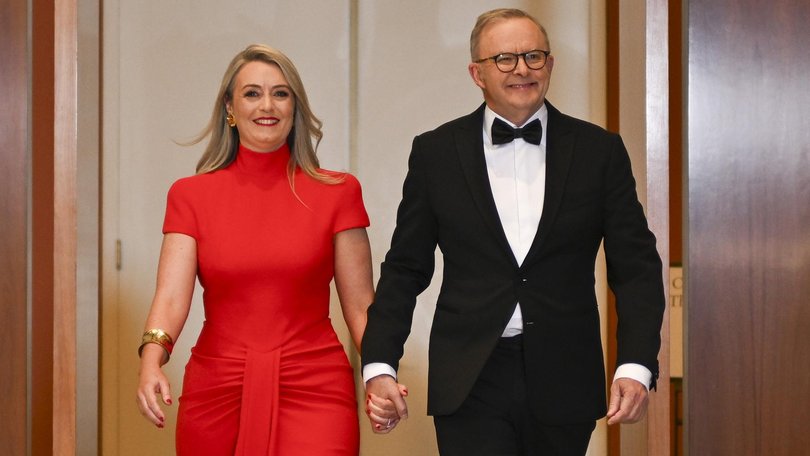 Prime Minister Anthony Albanese and fiancee Jodie Haydon arrive for the Federal Parliamentary Press Gallery Midwinter Ball at Parliament House in Canberra.