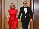 Prime Minister Anthony Albanese and fiancee Jodie Haydon arrive for the Federal Parliamentary Press Gallery Midwinter Ball at Parliament House in Canberra. NewsWire / Martin Ollman