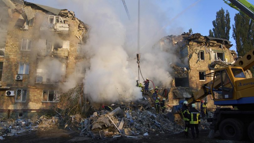 A Russian missile and drone attack has killed at least 21 people and injured more, Ukraine says. (AP PHOTO)