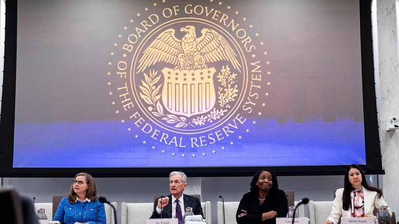 Jerome Powell and Lisa Cook during the Federal Reserve Board open meeting earlier this year.