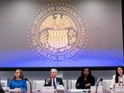 Jerome Powell and Lisa Cook during the Federal Reserve Board open meeting earlier this year. 