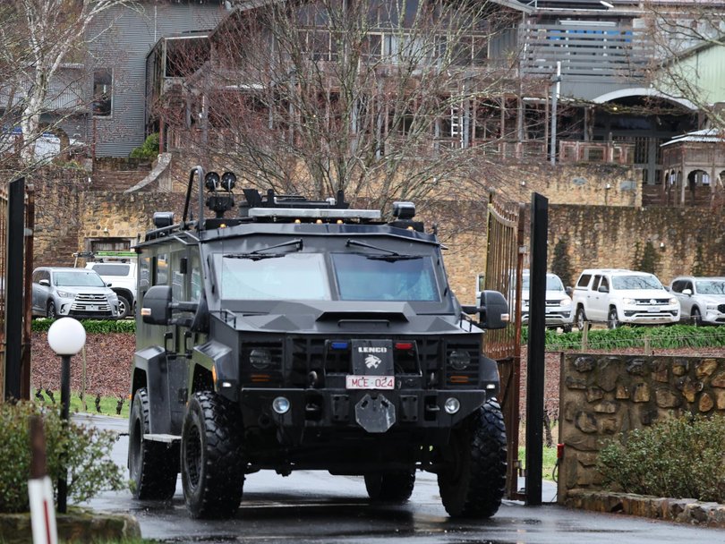 A bear cat leaving Feather Top Winery, where police are actively searching for the alleged killer, Dezi Freeman, who remains on the run.