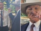 Federal MP Bob Katter has confronted a reporter at a Brisbane media event, accusing him of racism.