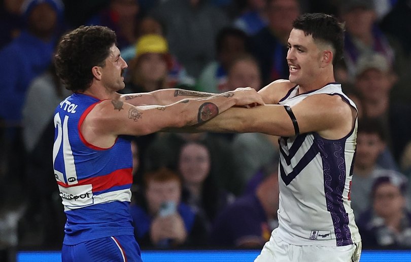 Tom Liberatore and Patrick Voss going at it on Sunday.