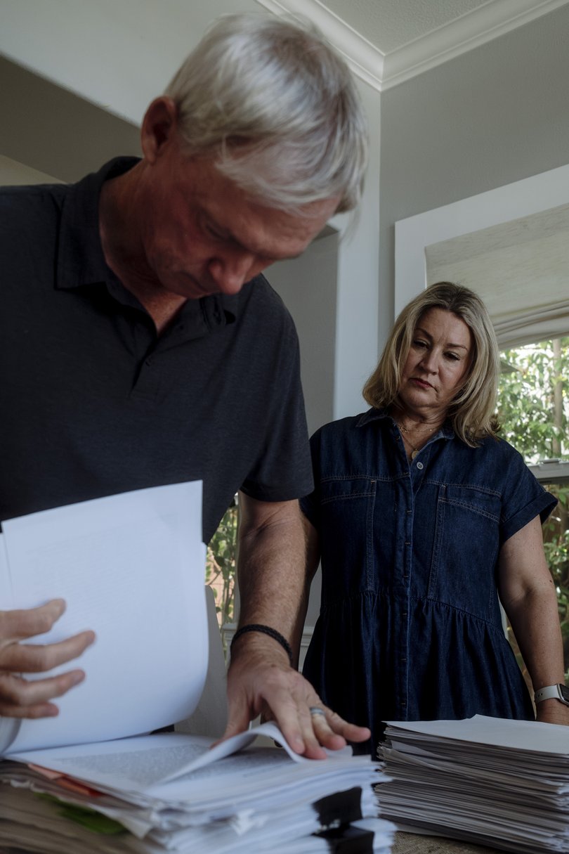 Matt and Maria Raine go through some of the printouts of conversations their son Adam had with ChatGPT before his suicide.