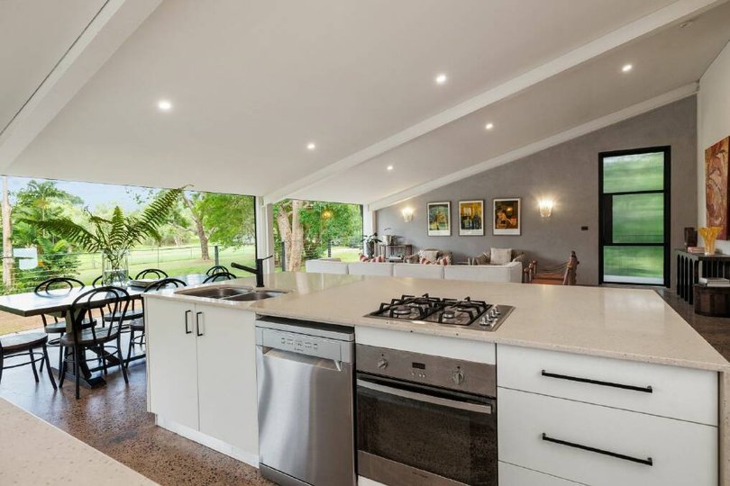 The kitchen features Taj Mahal stone benchtops.