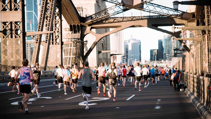 TCS Sydney Marathon Runners over the Sydney Harbour Bridge.
