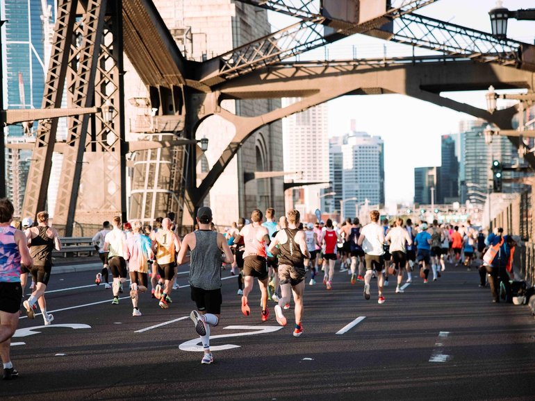 TCS Sydney Marathon Runners over the Sydney Harbour Bridge.