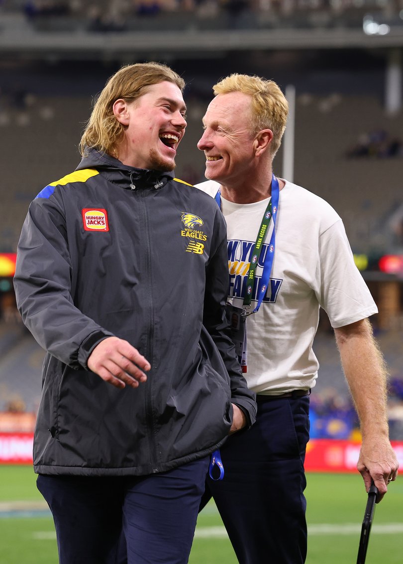 Harley Reid of the Eagles shares a moment with Karl Langdon.