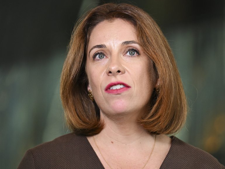 Minister for Communications, Anika Wells, holds a press conference at Parliament House in Canberra. 