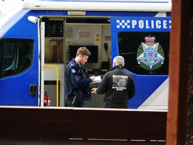 Many people in the town of Bright are giving information at a police van set up on the main street. Picture: NewsWire / Blair Jackson