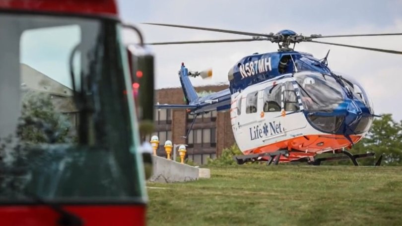 A three-year-old boy has survived after he was run over by an industrial lawnmower.