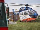 A three-year-old boy has survived after he was run over by an industrial lawnmower.