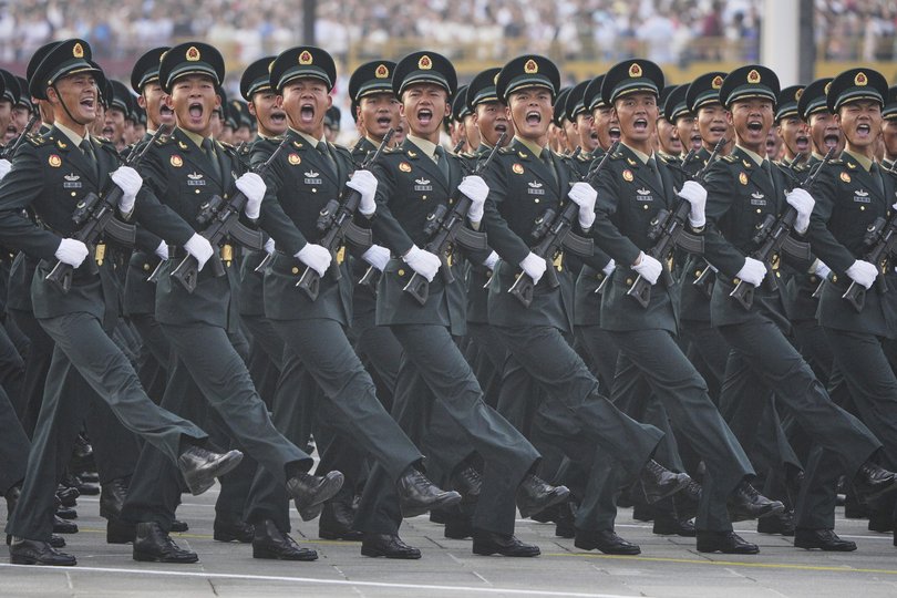 Chinese military personnel rehearse ahead of a military parade to commemorate the 80th anniversary of Japan's World War II surrender.