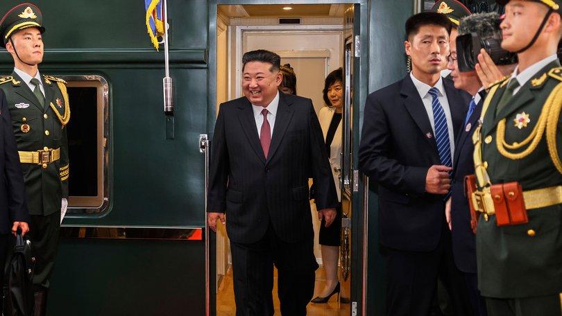 In this photo released by Xinhua News Agency, North Korea leader Kim Jong disembarks from his train in Beijing.
