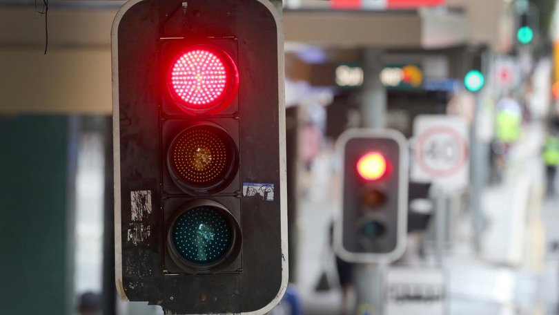 Allowing cars to turn left on red would ‘bring Qld's road rules into the 21st century’.