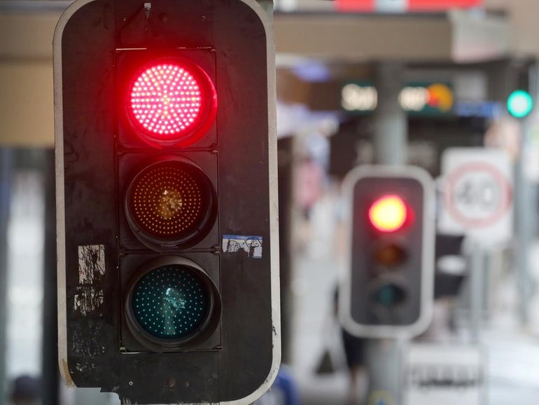 Allowing cars to turn left on red would ‘bring Qld's road rules into the 21st century’.
