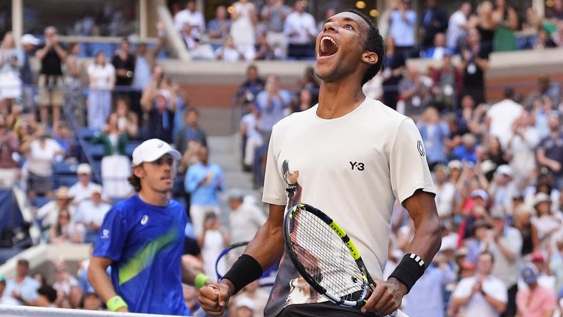 Alex de Minaur has much to ponder as Felix Auger-Aliassime roars with delight after his US Open win. (AP PHOTO)