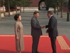 Daniel Andrews is greeted by Xi Jinping.