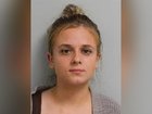 An evil nursery worker smirked and tried to downplay her involvement as she was arrested for attacking 21 babies.