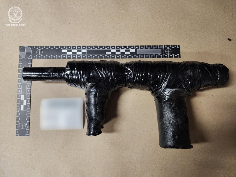 The men were arrested ad the ‘slam guns’ were seized by police.