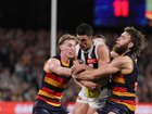 ADELAIDE, AUSTRALIA - SEPTEMBER 04: Scott Pendlebury of the Magpies is tackled by Riley Thilthorpe of the Crows  during the AFL First Qualifying Final match between the Adelaide Crows and the Collingwood Magpies at Adelaide Oval on September 04, 2025 in Adelaide, Australia. (Photo by James Elsby/AFL Photos via Getty Images)