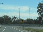 Two killed after stopping on highway.