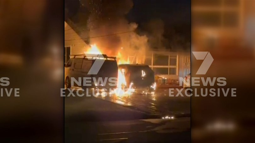 Neighbours called Triple-0 when they heard an explosion and saw flames shooting out of a car in Smithfield driveway.