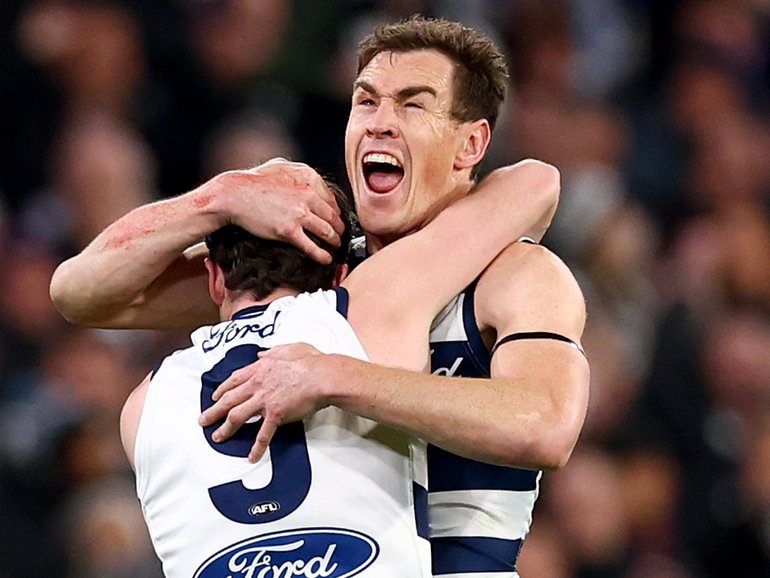 MELBOURNE, AUSTRALIA - SEPTEMBER 05: Max Holmes of the Cats is congratulated by Jeremy Cameron after kicking a goal during the AFL Qualifying Final match between Geelong Cats and Brisbane Lions at Melbourne Cricket Ground on September 05, 2025 in Melbourne, Australia. (Photo by Daniel Pockett/Getty Images)