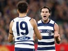 MELBOURNE, AUSTRALIA - SEPTEMBER 05: Jack Martin (left) and Jack Bowes of the Cats celebrate during the AFL Second Qualifying Final match between the Geelong Cats and the Brisbane Lions at the Melbourne Cricket Ground on September 05, 2025 in Melbourne, Australia. (Photo by Michael Willson/AFL Photos via Getty Images)