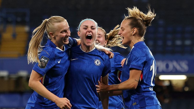 Ellie Carpenter celebrates with her new Chelsea teammates.