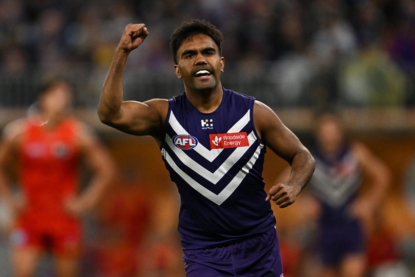 Isaiah Dudley of the Dockers celebrates a goal.