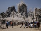 The Israeli military has bombed a high-rise building in Gaza City after warning civilians. (AP PHOTO)
