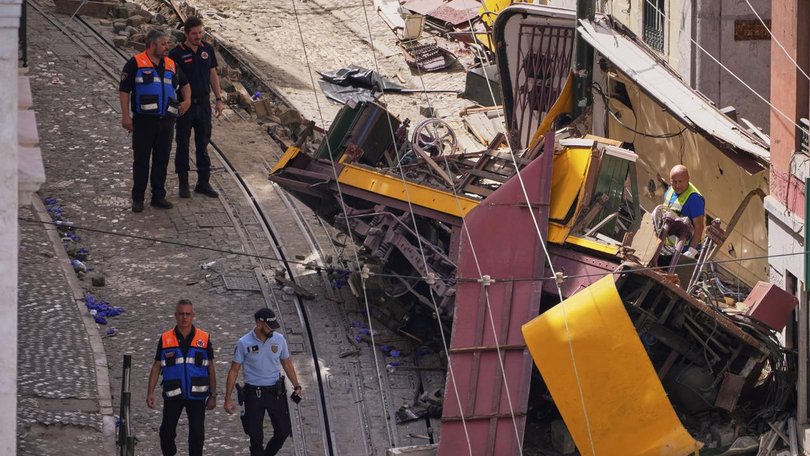 Sixteen people were killed and 21 others injured in one of Lisbon's worst tragedies in recent memory (AP PHOTO)
