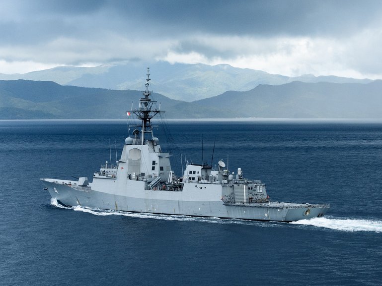 HMAS Brisbane pictured in 2024 as it transits through the Surigao Strait during a regional presence deployment.